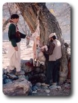 Local butcher at work, Kalash Kalley, Pakistan