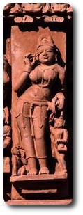 Woman applying eyeshadow, Parsvanath Temple, Khajuraho, India