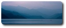 Calm before the storm on Lake Fewa, Pokhara, Nepal
