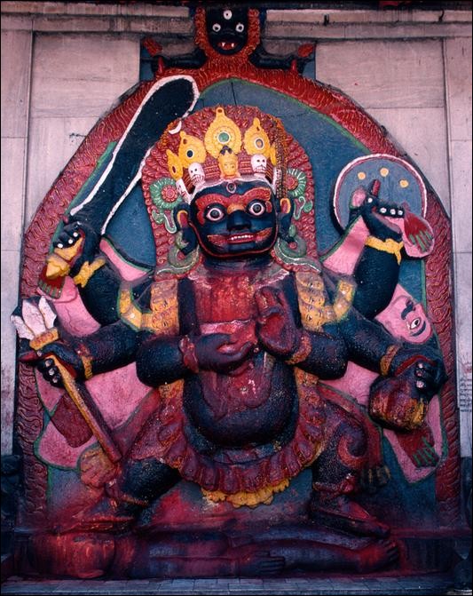 A god on a temple, Kathmandu, Nepal