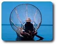 Fisherman with his net on Inle Lake, Myanmar
