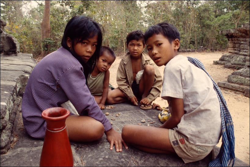 Children playing a game at the Thommanon, Angkor, Cambodia