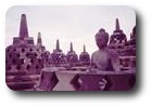 Buddha statue in stupa at Borobudur, Java, Indonesia