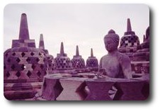 Buddha statue in stupa at Borobudur, Java, Indonesia