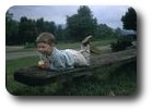Me lying on bench on Malvern Hills, England