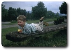 Me lying on bench on Malvern Hills, England