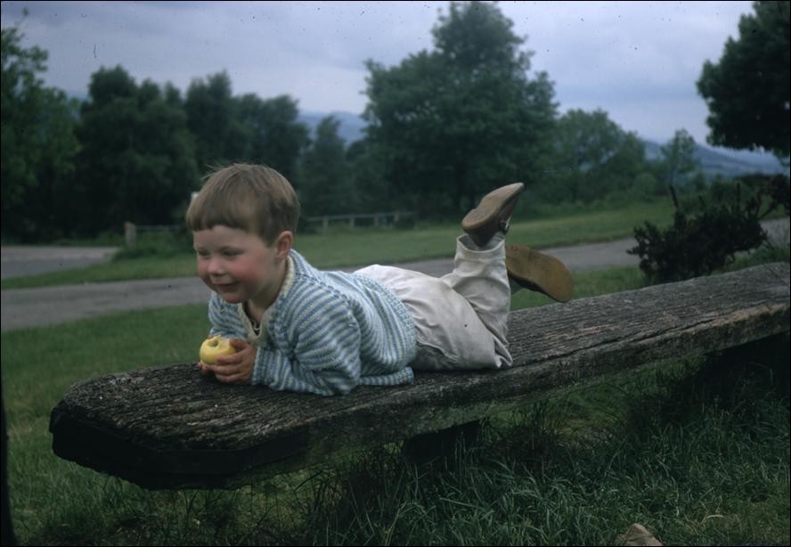 Me lying on bench on Malvern Hills, England